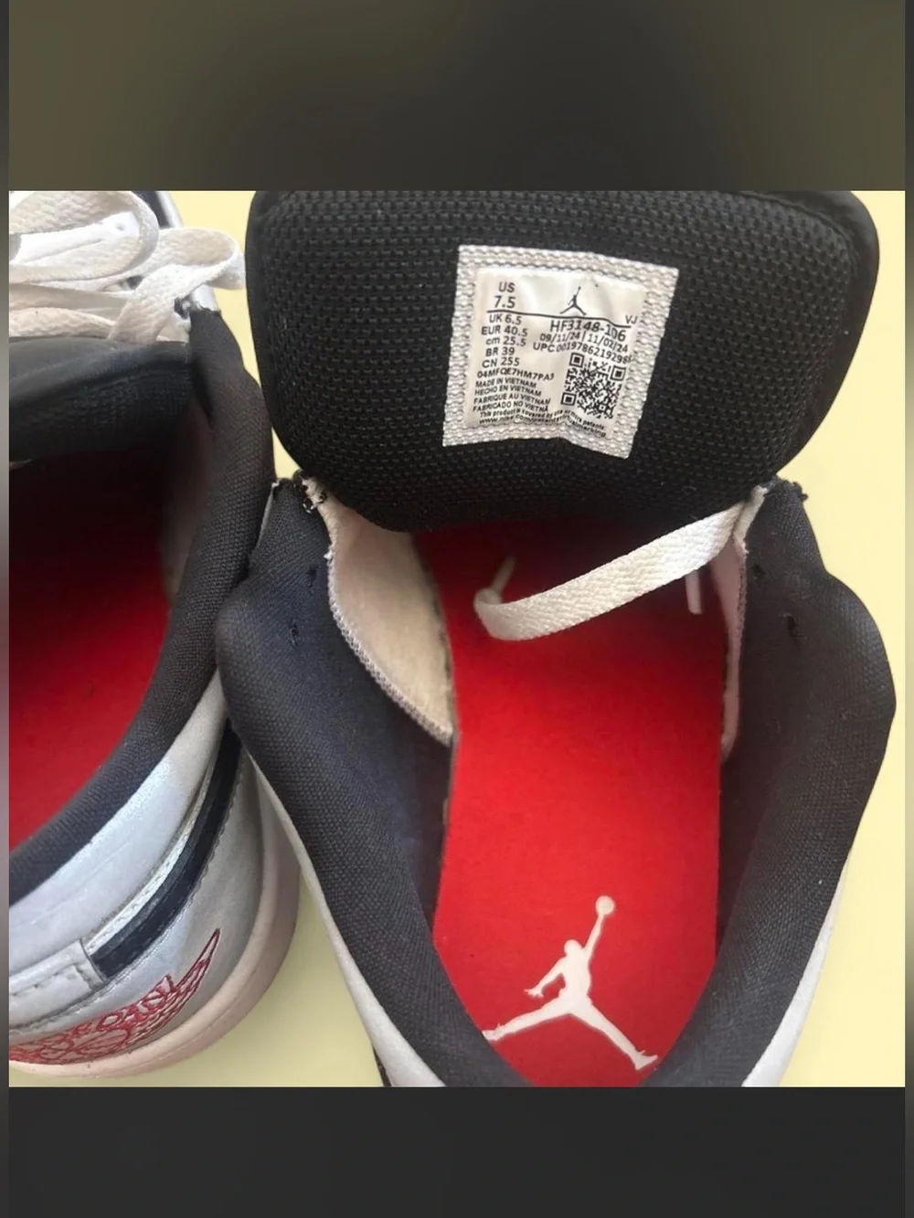 Nike Air Jordan 1 Low Black Metallic sneakers with black, white, red